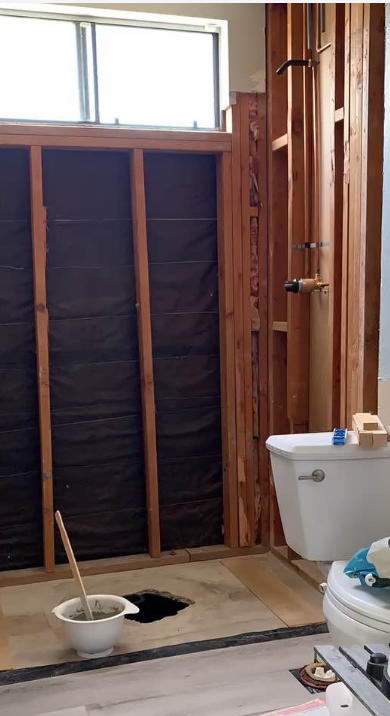 Shower area demolished to framing and vapour barrier ready for rebuild
